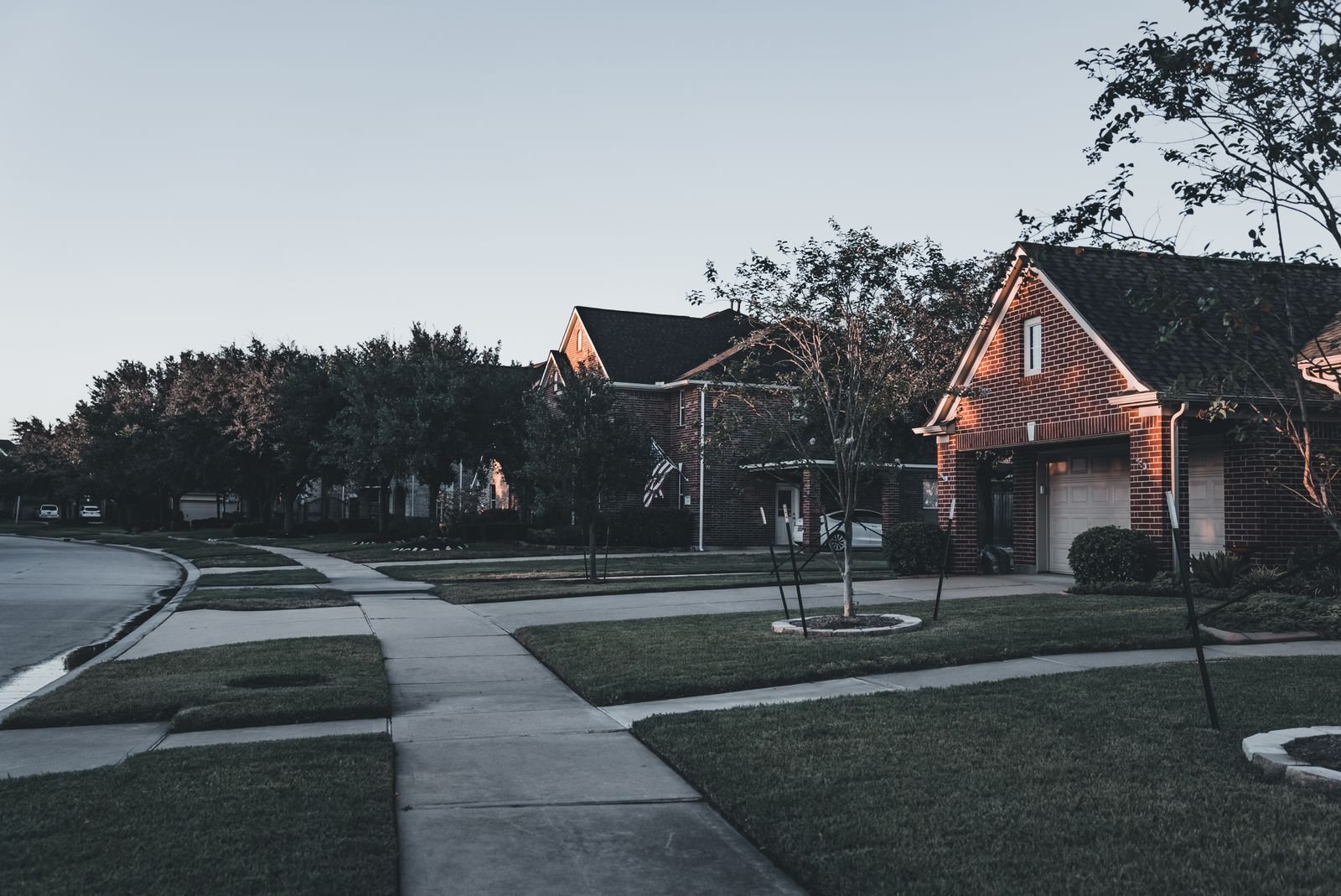 Row of brick single-family homes typical of new North Texas subdivisions