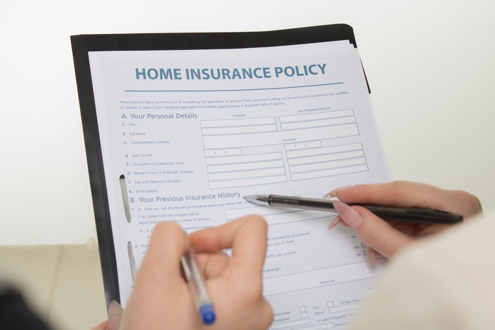 Insurance claim forms and notes for a water damage claim